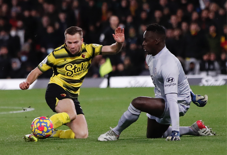 Chelsea's Edouard Mendy in action with Watford's Tom Cleverley