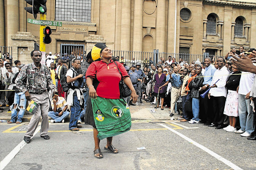 IN FULL CRY: Pretty Xaba outside the high court during Jacob Zuma's rape trial Picture: PAT SEBOKO