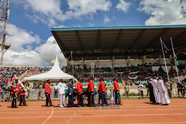 Military guards pull casket carriage bearing the body of the late Former President Mwai Kibaki at the Nyayo Stadium for a State Funeral attended by several heads of states and member of the Public on April 29,2022.PHOTO/ENOS TECHE