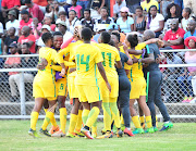 Leandra Smeda of South Africa celebrates a goal with teammates after scoring a goal.    