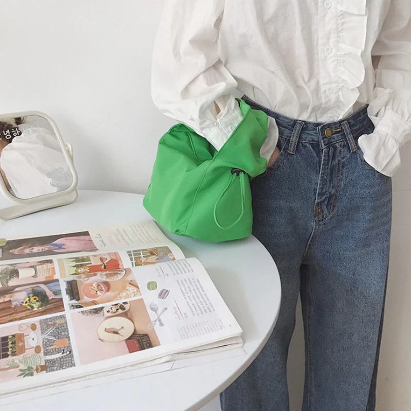 Simple Solid Color Macaron Handbag Mobile Phone Bag Small Bag Female Bag Cosmetic Bag offers stylish convenience for dai