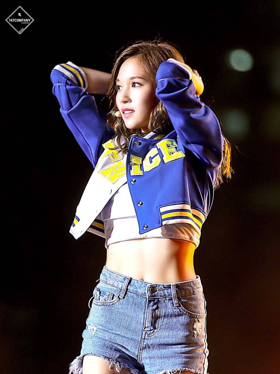 Mina looks great in a letterman jacket. 