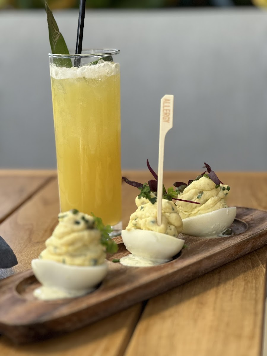 Deviled Eggs with a pineapple mocktail