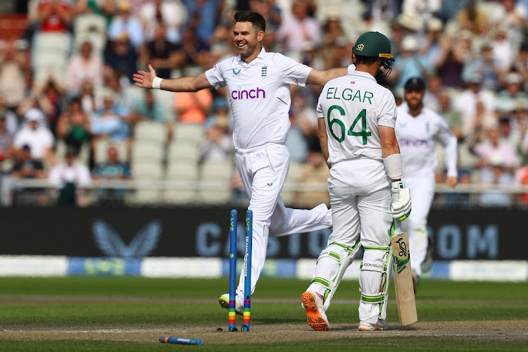 James Anderson of England celebrates bowling SA captain Dean Elgar on day 3 of the second Test at Old Trafford in Manchester on August 27 2022.