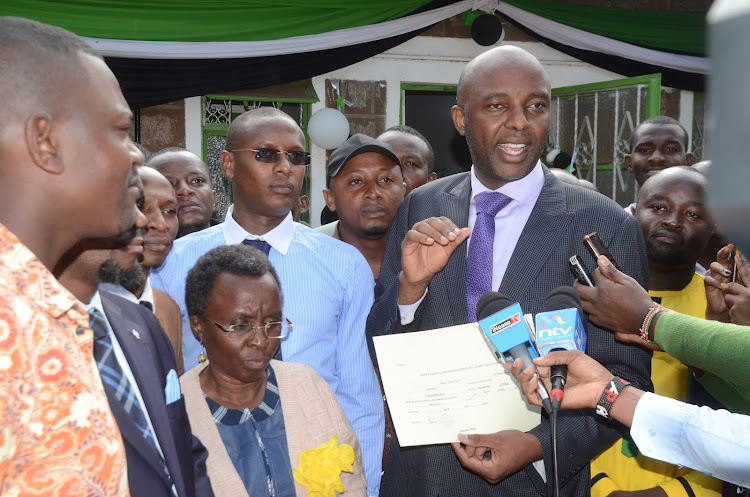 Murang'a governor aspirant Irungu Kang'ata outside IEBC offices in Murang'a town on June 7, 2022.