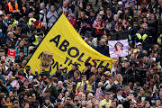 Protesters in Trafalgar Square ahead of the coronation ceremony of King Charles III and Queen Camilla at Westminster Abbey, London. Picture date: Saturday May 6, 2023. 