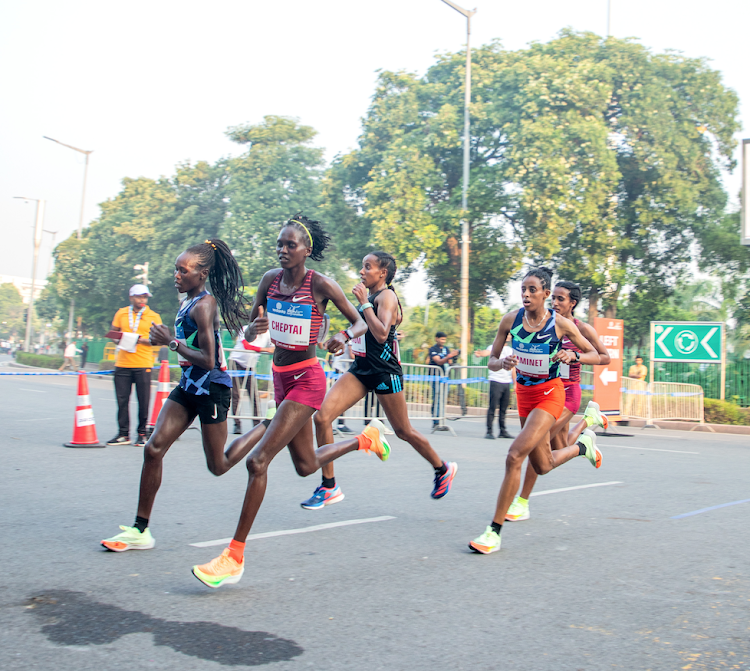 Eventual winner Kenya's Irine Cheptai leading the women's race at the Vedanta Delhi Half Marathon 2022