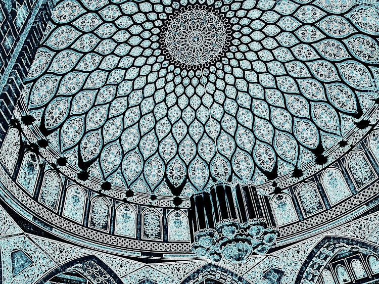 The stunning interior dome of the Ibn Battuta Mosque in Dubai.