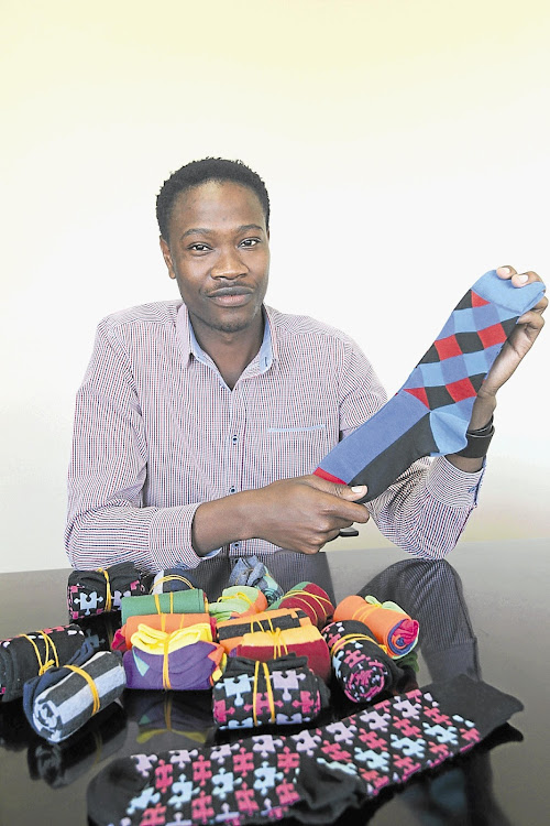 GOLDEN THREADS: Sibusiso Ngwenya, the founder of Skinny Sbu Socks.