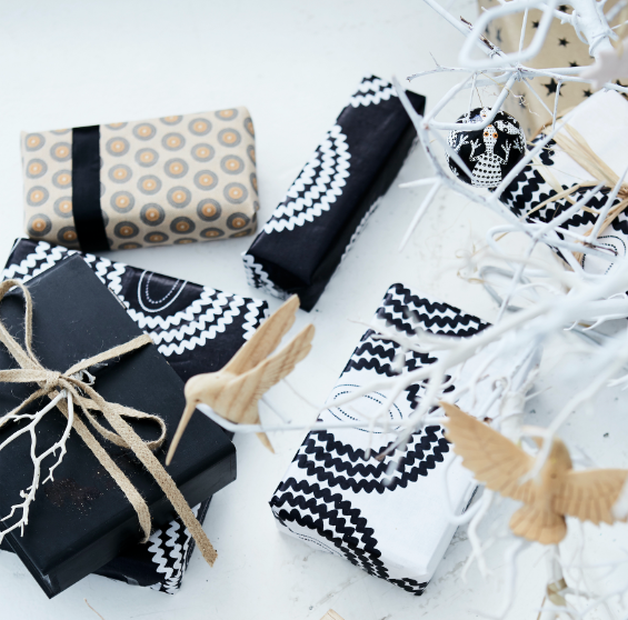 Gifts in graphic black and white patterns combined with natural accents.