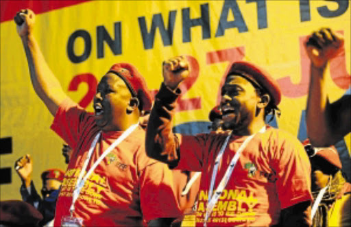 File image: EFF leader Julius Malema sings with his national spokesman Mbuyiseni Ndlozi. Photo: Tsheko Kabasia