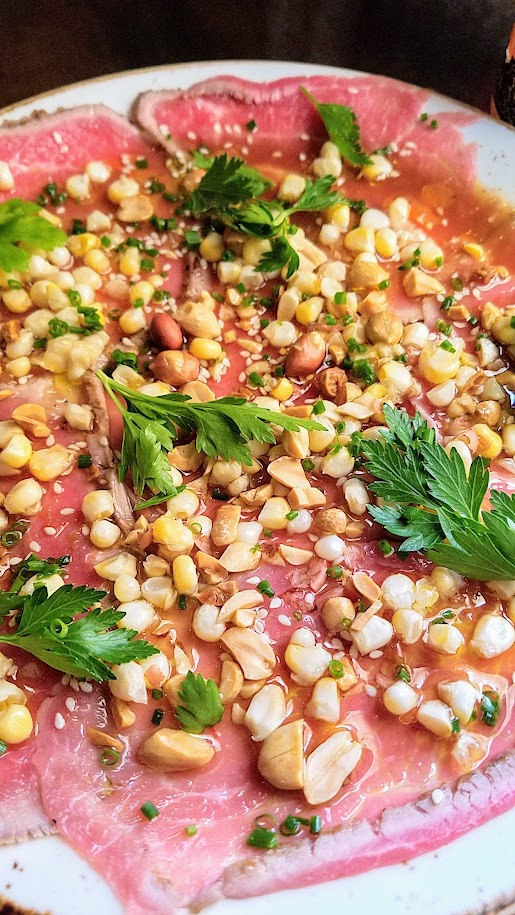 Quaintrelle Happy Hour, Quaintrelle continues to offer the best carpaccio in town with their Beef carpaccio with peanuts, ponzu, wasabi