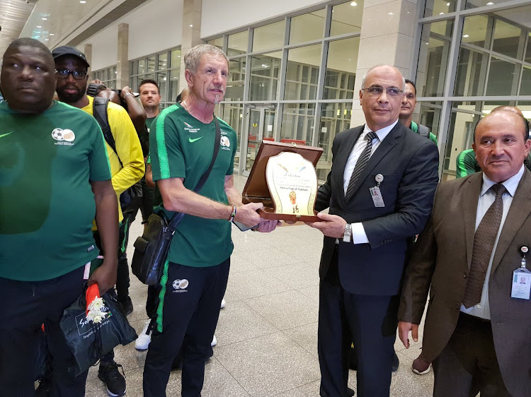 Bafana Bafana touched down at Cairo International Airport in the early morning hours of Tuesday June 18 2019 and coach Stuart Baxter was presented with the Afcon plaque.