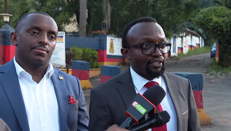 Lawyer Ndegwa Njiru addressing the press outside Nairobi Regional Police Headquarters together with his client Businessman James Wanjohi on Monday, May 6, 2024.