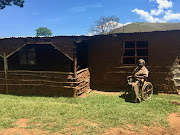 Mbuso 'British' Mkhize outside his home. 