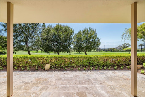 Terrace with golf course and trees view in this luxury apartment for sale in Newport Beach ($2,895,000 - 201 m²)