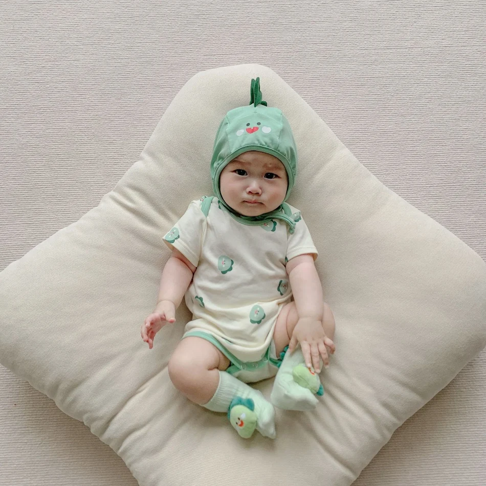 Combinaison d'été imprimé dinosaure style Ins, vêtement enveloppant pour bébé, idéal pour ramper, doux et respirant, parfait pour l'été.