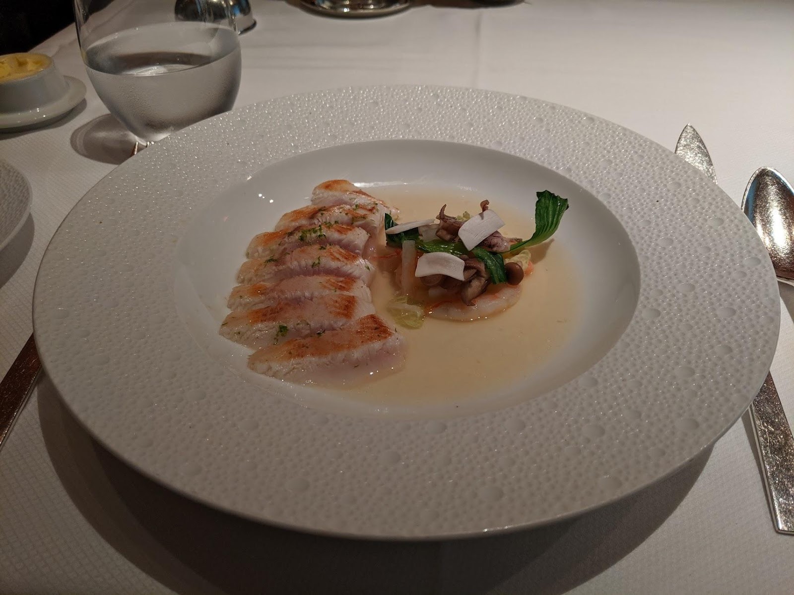 Le Bernardin Seared Hiramasa; Baby Shrimp, Calamari, Lemongrass-infused bouillon