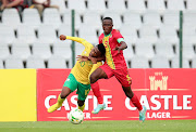 Mduduzi Shabalala of South Africa Under-23 challenged by Davarel Diambomba Mouandza of Congo in the Olympic and Africa Cup of Nations qualifying first leg match at Dobsonville Stadium on March 23 2023.