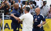 Mamelodi Sundowns coach Manqoba Mngqithi and Orlando Pirates coach Jose Riveiro during the MTN8 semifinal first leg match at Orlando Stadium on October 1 2022.