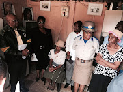 ANC's Mathole Motshekga (left) visited the grieving Mdaki family in Etwatwa on November 22.