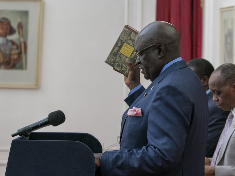 George Magoha being sworn in