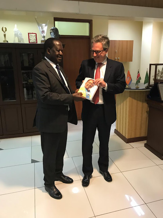 ODM chief Raila Odinga and outgoing British High Commissioner Nic Hailey during a farewell call on July 16