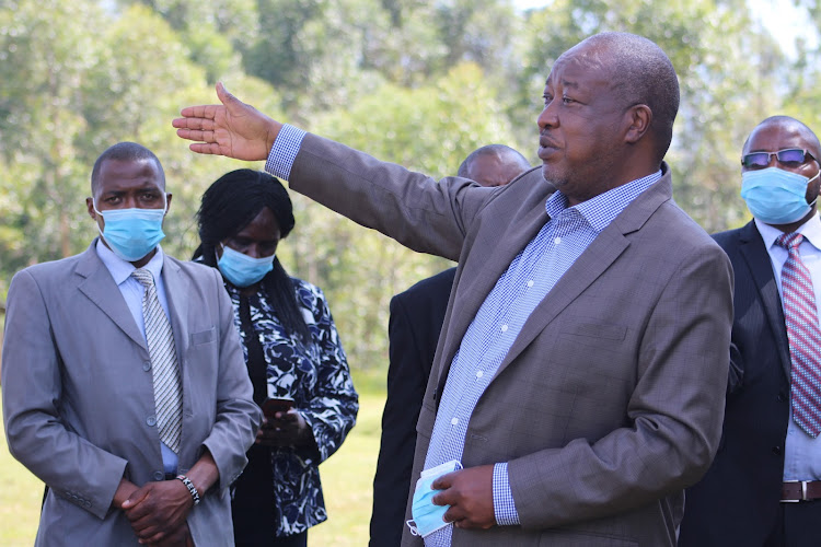 Nyamira Governor Amos Nyaribo at the project site with county officials.