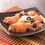 Simple Chicken Enchiladas Recipe was pinched from <a href="http://www.tasteofhome.com/recipes/simple-chicken-enchiladas" target="_blank">www.tasteofhome.com.</a>