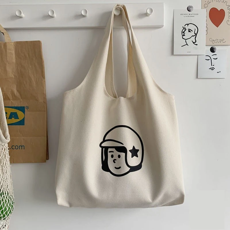 Sac à bandoulière japonais simple et polyvalent, grande capacité pour livres et objets essentiels. Idéal pour un usage quotidien, pratique et stylé.