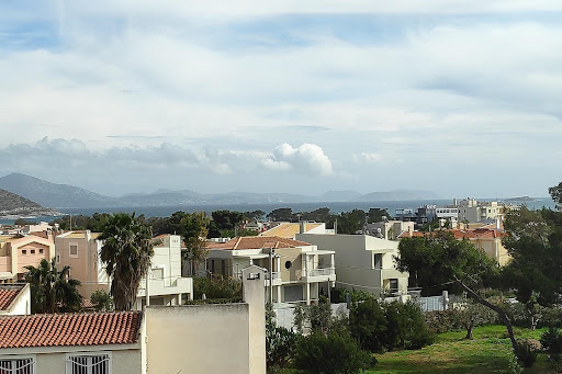 Luxury villa for sale in Vari (Greece) - Aerial view of houses and sea