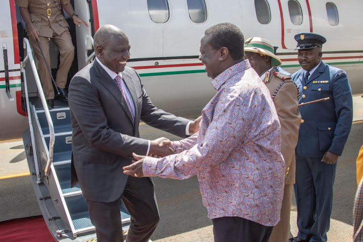 President William Ruto with the Prime Cabinet Secretary Musalia Mudavadi when he arrived in Kakamega on December 8.