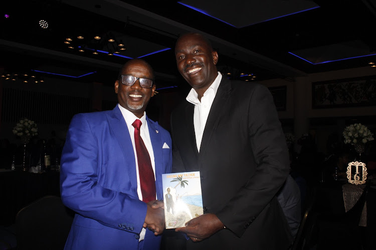 Old Starehian Society chairman Raymond Rono and National Oil's Chrinus Genge