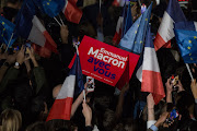 Supporters of Emmanuel Macron, France's president, celebrate following the second round of voting in the French presidential election, in Paris, France, on Sunday, April 24, 2022.  