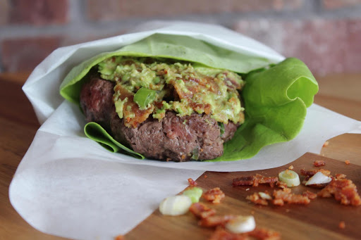 green onion burgers with bacon and avocado butter