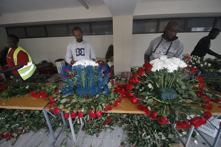 Florist prepare flowers to be used for decoration ahead of the late and Former President Mwai Kibaki's state funeral scheduled to take place at the Nyayo National Stadium on Friday, April 29,2022