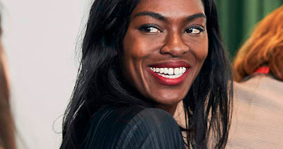 Woman turned around smiling, Black Founders Fund Africa, Global Programs, Google for Startups