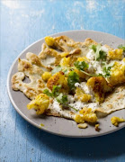 <p><b>Spicy cauliflower-filled pancakes with coriander yogurt sauce</p></b>
<p>Cumin is the star of the spice rack as far as this vegetarian recipe's concerned; it's used in both the crepe batter and the flavourful cauliflower filling. Serve this dish with salad for a light lunch or dinner.</p>