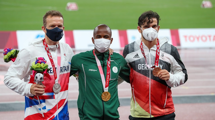 Ntando Mahlangu of South Africa receives his gold medal in the mens 200m T61 during the evening session of athletics on Day 10 of the Tokyo2020 Paralympic Games at the Olympic Stadium on September 03, 2021 in Tokyo, Japan.