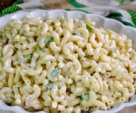 This is a family recipe from my husband's family. They owned a deli in NJ many years ago, and this is the mac salad that they made.