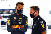 Alexander Albon of Thailand and Red Bull Racing and Red Bull Racing Team principal Christian Horner ahead of the F1 Grand Prix of Abu Dhabi at Yas Marina Circuit on December 12.