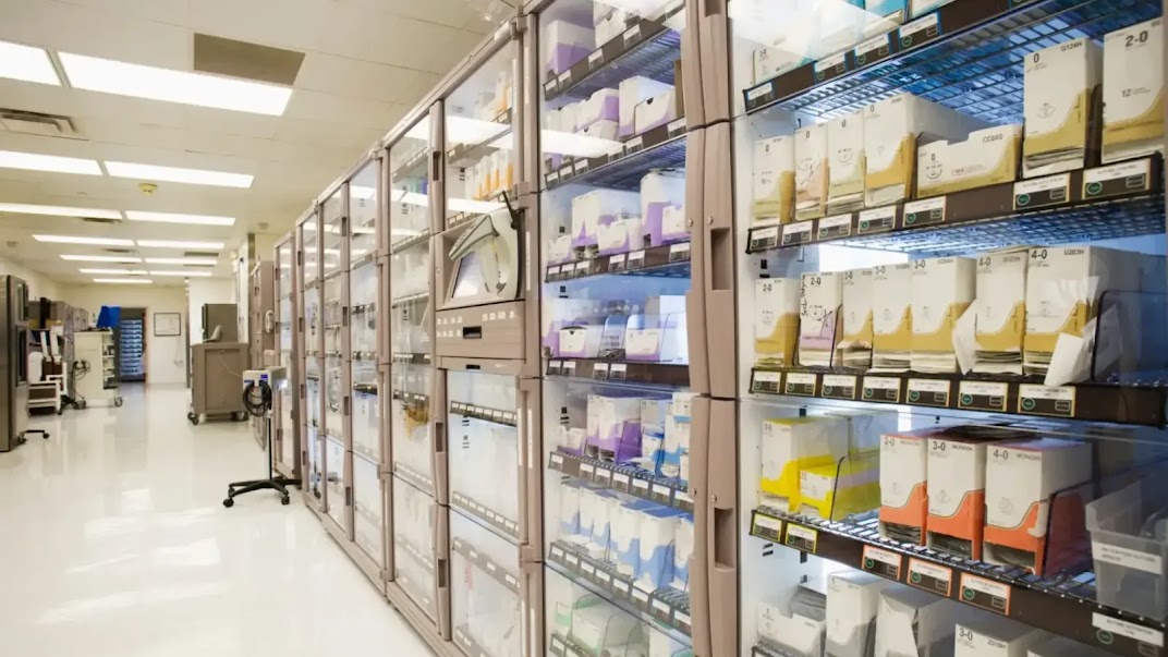 A fridge storing many different types of medicine, boxed in various colors.