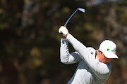 Li Haotong of China plays his shot from the 15th tee during the second round of the 2020 PGA Championship at TPC Harding Park in San Francisco, California on August 7, 2020.