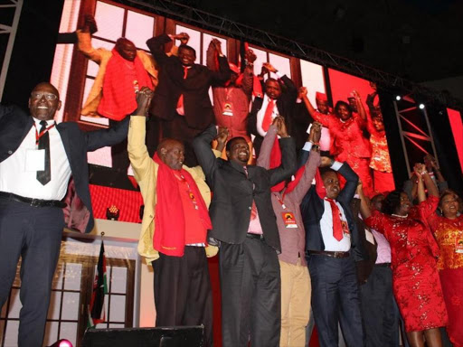 Some of the opposition MPs who defected to Jubilee Party during the national convention meeting at Safaricom Stadium Kasarani in Nairobi, September 10, 2016. /COLLINS KWEYU