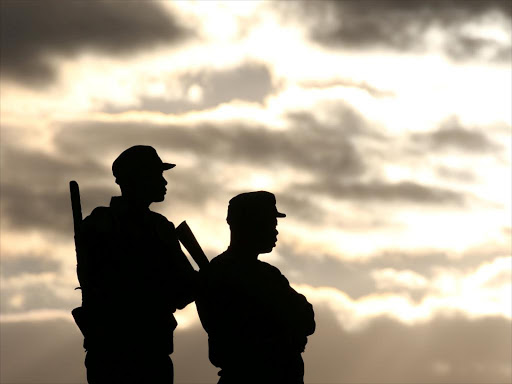 Police officers stand guard during a political rally addressed by Zimbabwe president Robert Mugabe (not in the picture) in Bindura, north of the capital Harare, July 8, 2016 /REUTERS