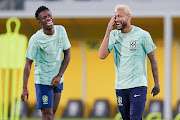 Neymar and Vinicius Junior of Brazil during a training session  at Al Arabi SC Stadium on December 8 2022 in Doha, Qatar. 