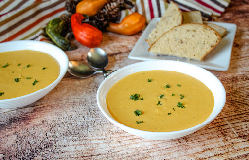 Two bowls oF Roasted Butternut Squash Soup.