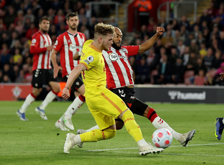 Liverpool's Harvey Elliott in action with Southampton's Nathan Redmond