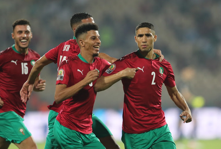 Morocco's player Achraf Hakimi (right) celebrates after he scored their second goal against Gabon on Tuesday.