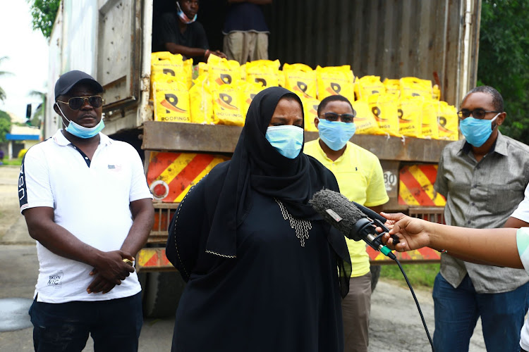 Kilifi governor's office chief officer Amina Nassor speaks after receiving food donations from Roofings Kenya Ltd in Mtwapa on Saturday, April 18